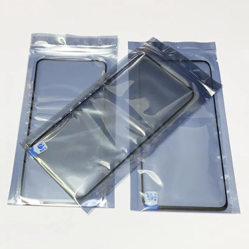 OnePlus 7 Pro replacement touch screen glass panel showing manufacturer logo and clear glass surface