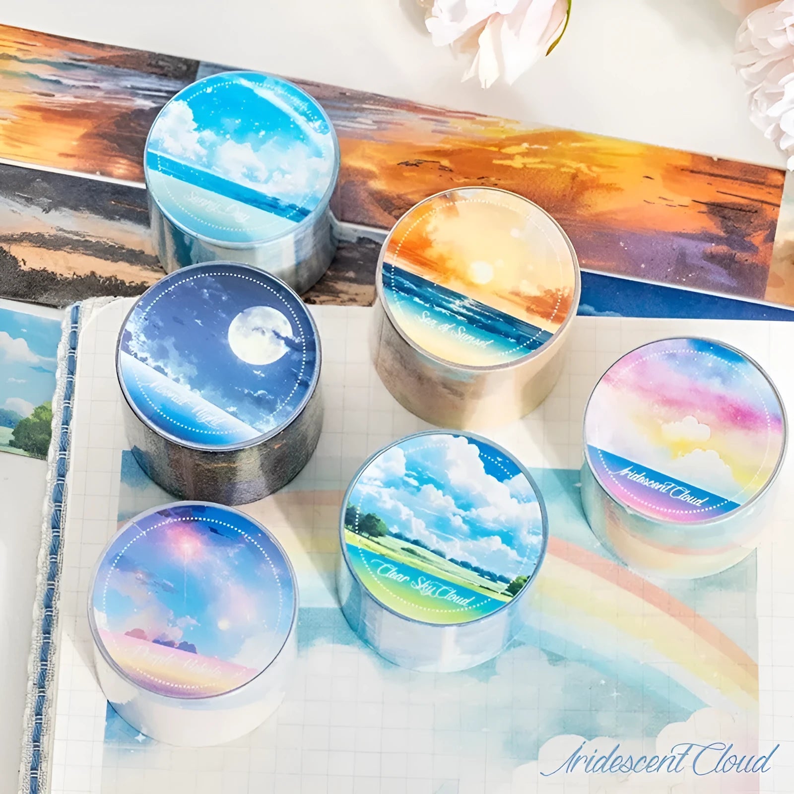 Japanese paper decorative tape roll with sky patterns including clouds, twilight and nebula designs