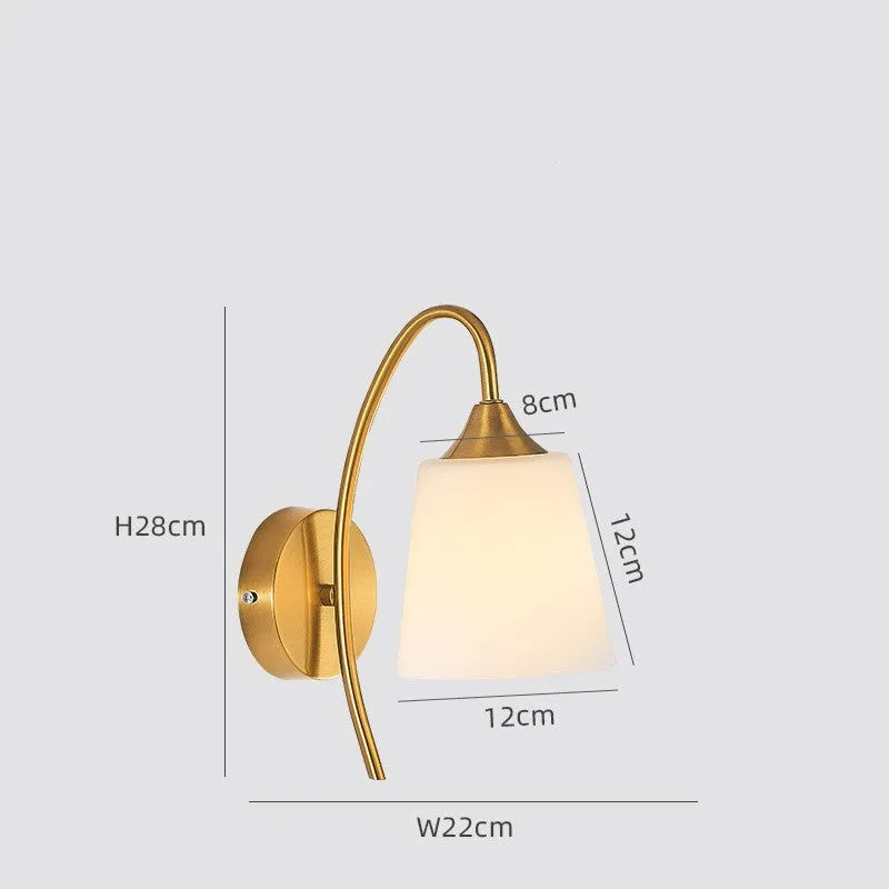 Modern copper coloured wall lamp with glass lampshade for bedroom or hallway lighting
