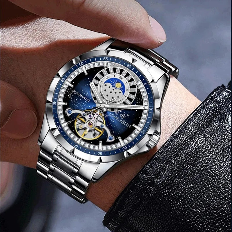 Men's automatic mechanical watch with silver case, blue dial, and stainless steel bracelet.