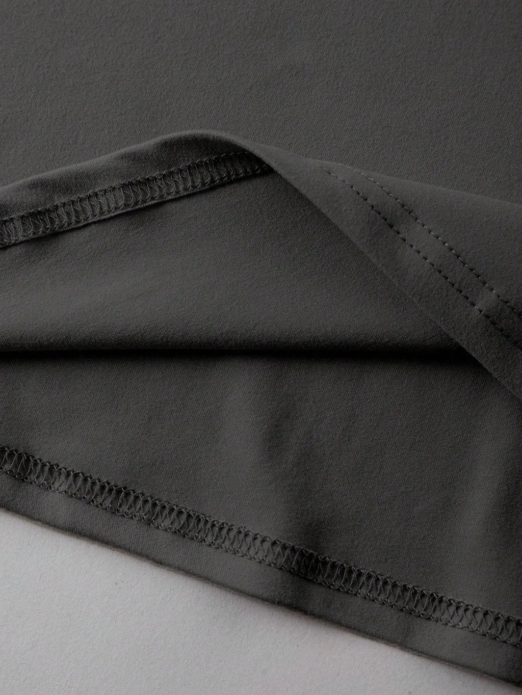 A loose, straight-cut cotton T-shirt for men and women in various colours.