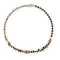 Tigereye stone and bronze geometric bracelet with texture details and bends design