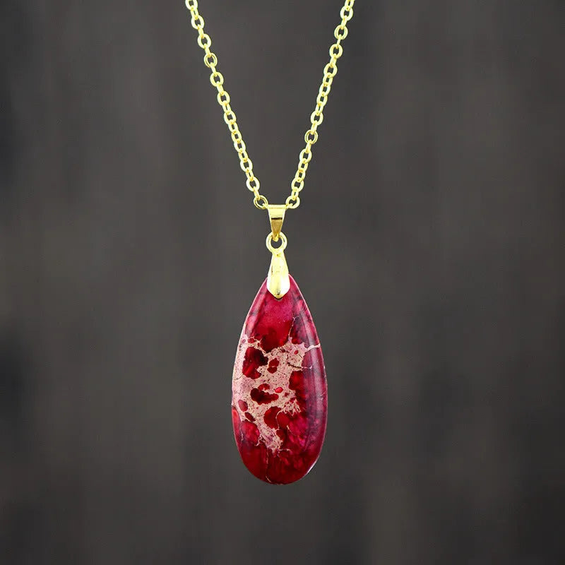 Emperor Stone water drop shaped jade pendant necklace with 18K gold plating on a chain.