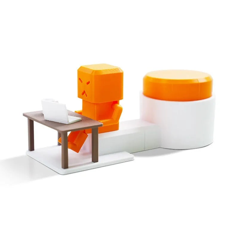 Orange plastic vent decompression artefact, a table turning fidget toy measuring 16x6x7 cm.