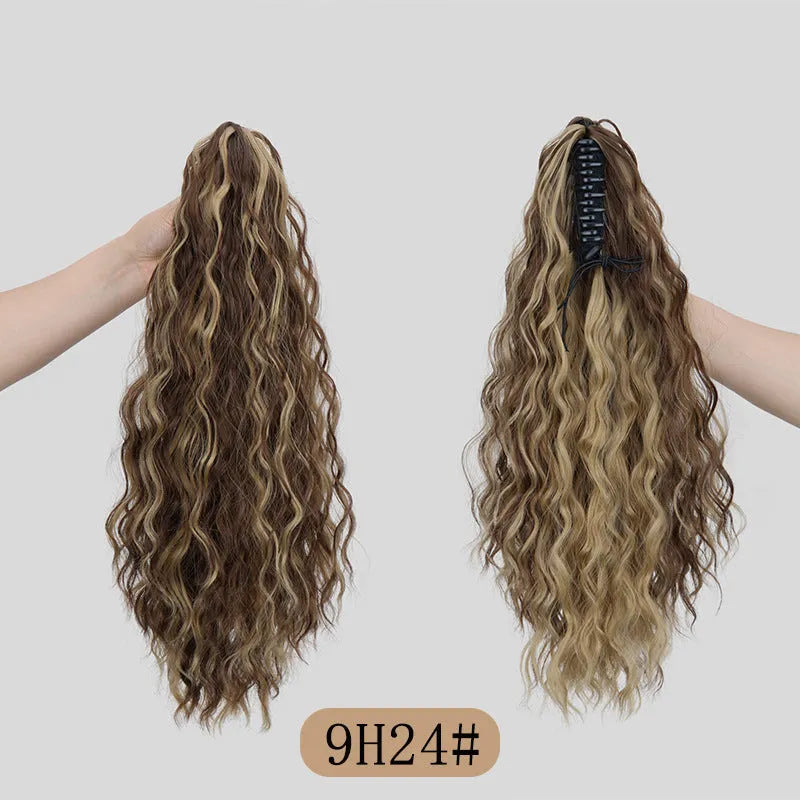 Synthetic corn curler wig with a textured water ripple grip ponytail, shown in a shade from the available colour range.