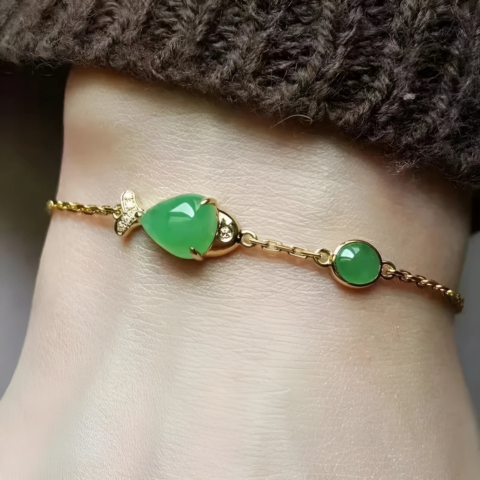 Copper retro-style bracelet with a yellow gold electroplated finish on a wrist.
