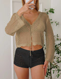 Short length women's cardigan blouse with bell sleeves in apricot colour.