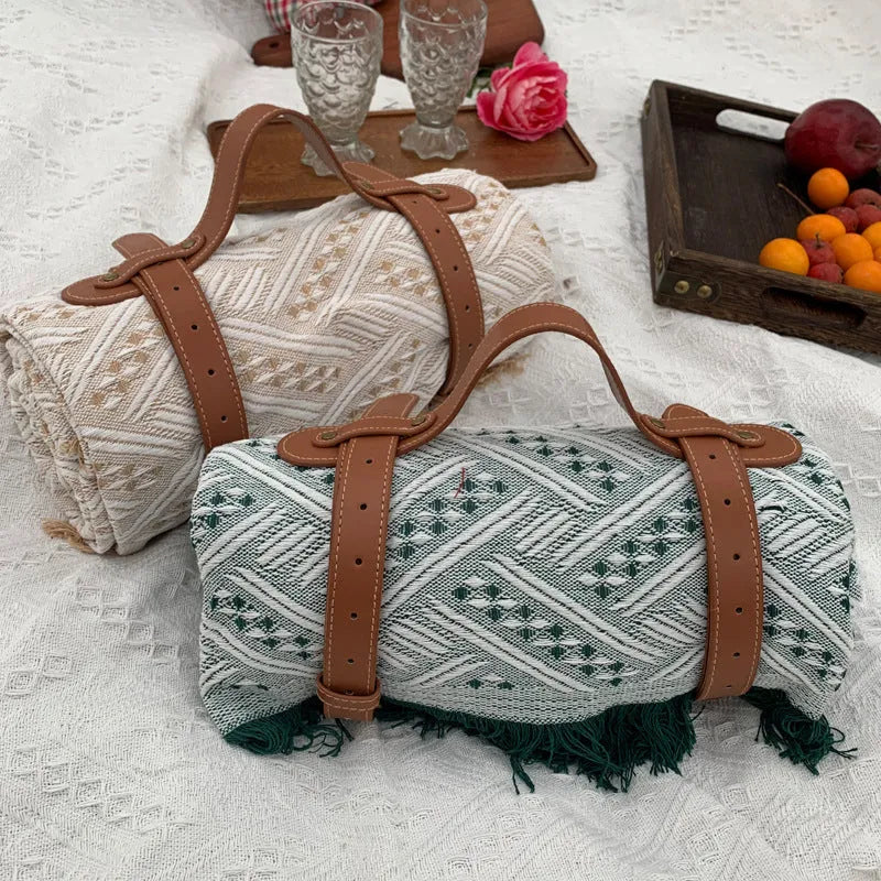 Chessboard plaid knitted picnic blanket with tassel edging and leather handle, acrylic camping rug