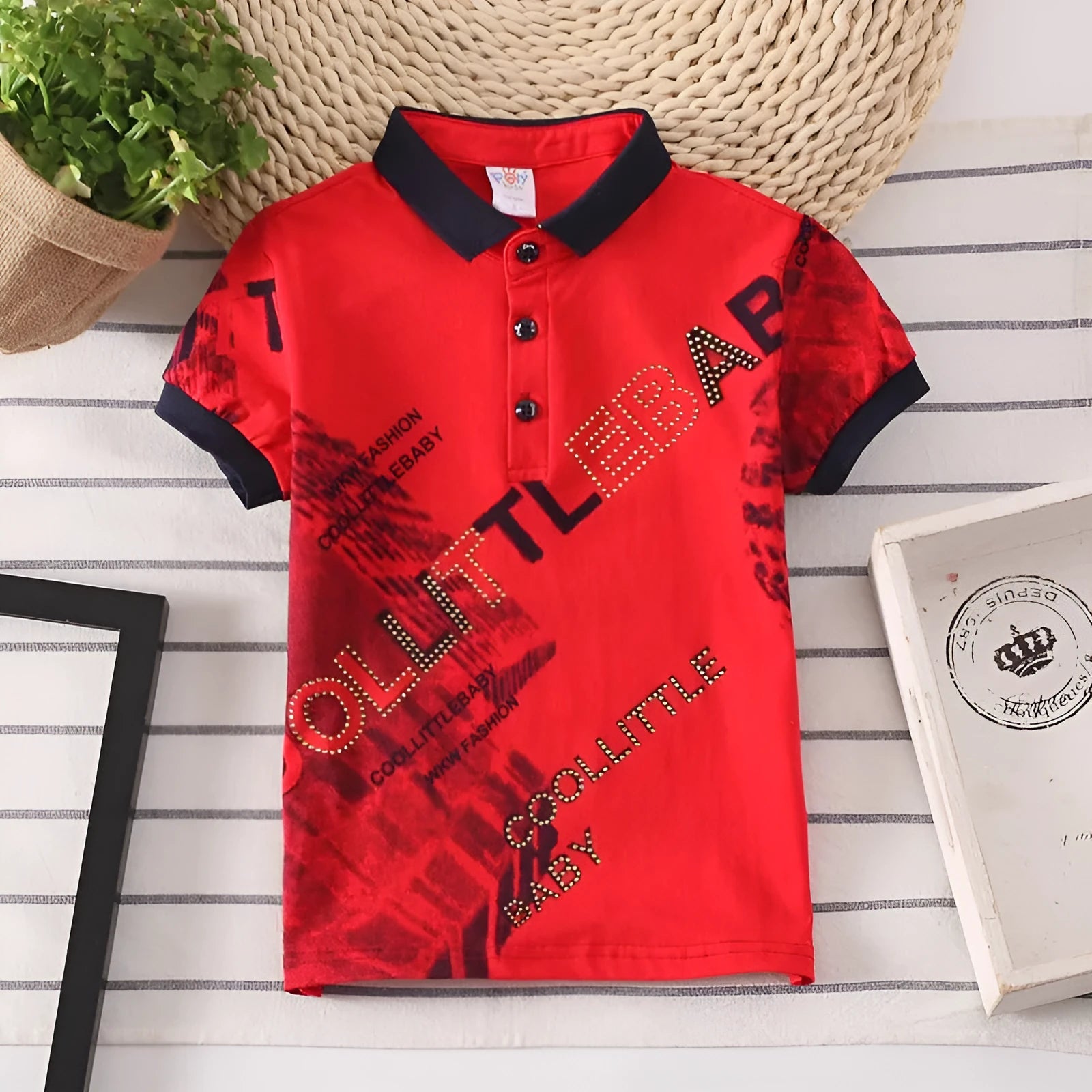 A solid colour short sleeve polo shirt for a young boy, made from soft cotton fabric.