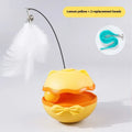 Electric cat toy tumbler ball in soft fog grey colour, showing smooth plastic surface and on/off switch on base.
