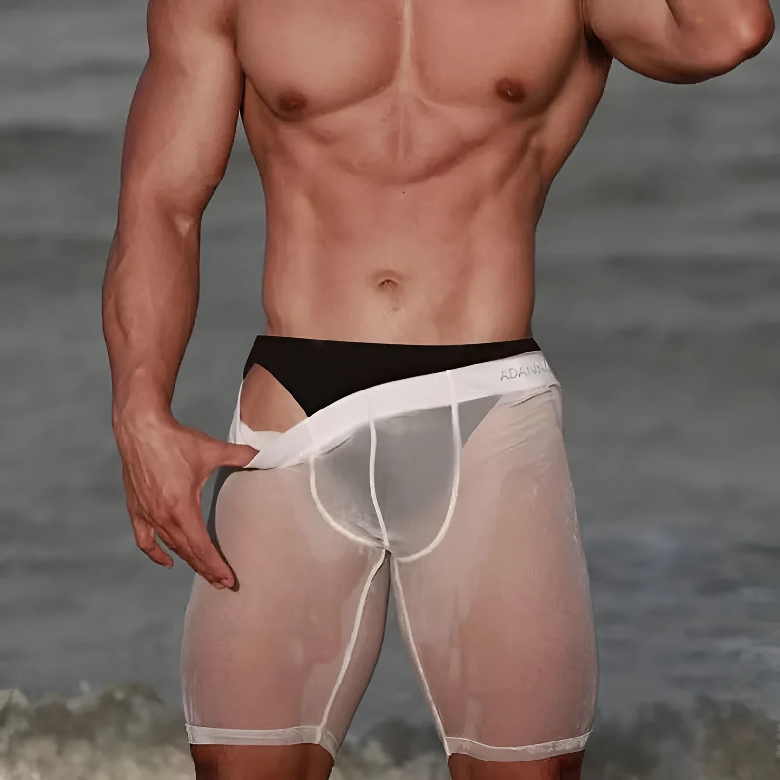 Men's black mesh home shorts with seamless knitted construction and hip-lifting function