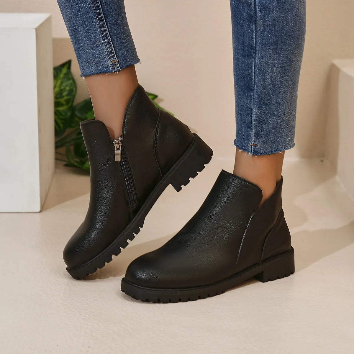 Women's casual low-cut ankle boots in dark brown with chunky heel, side zipper, and stitching on synthetic PU upper