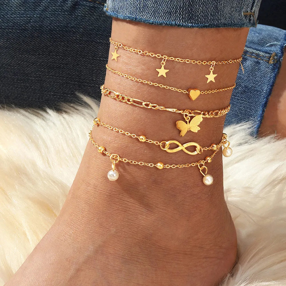 Butterfly pearl heart four-piece anklet set for women with multi-layer alloy chains