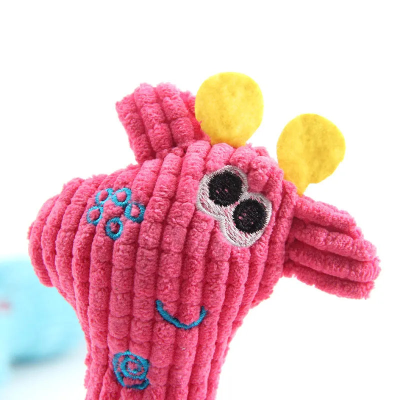 Blue deer-shaped plush dog toy with corn grain texture and squeaker.