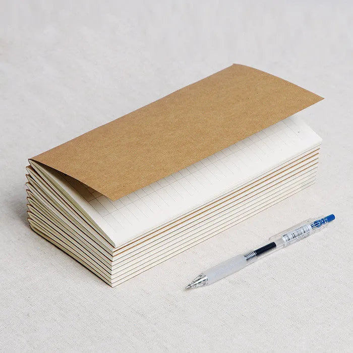 Cowhide diary refill insert showing dot grid and ruled pages with 11x21cm dimensions