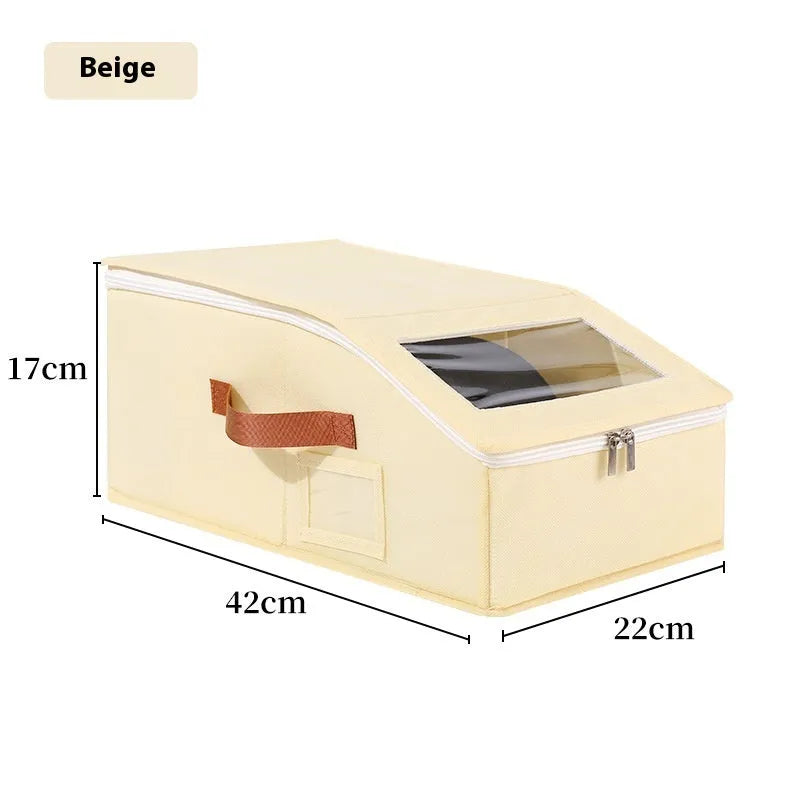 Grey foldable and stackable woven fabric storage box for organising baseball caps and shoes.