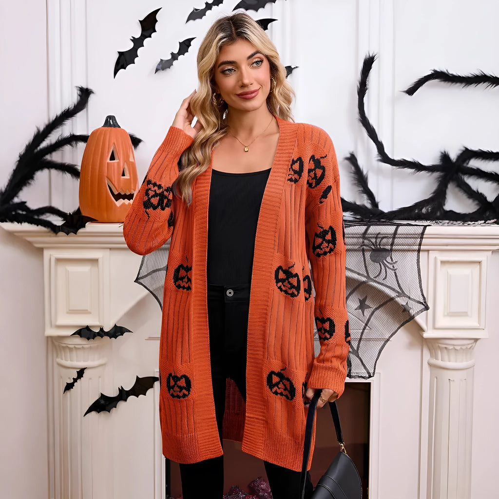 Women's black cardigan with orange pumpkin head jacquard pattern, open front, regular sleeves.