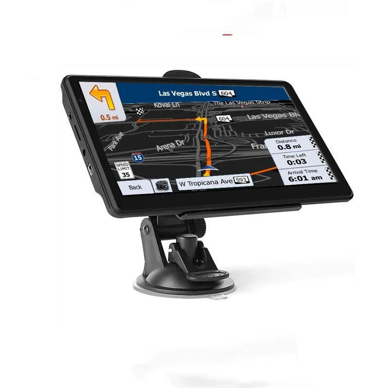 7-inch portable car GPS navigation device on a dashboard with mounting bracket and car charger.