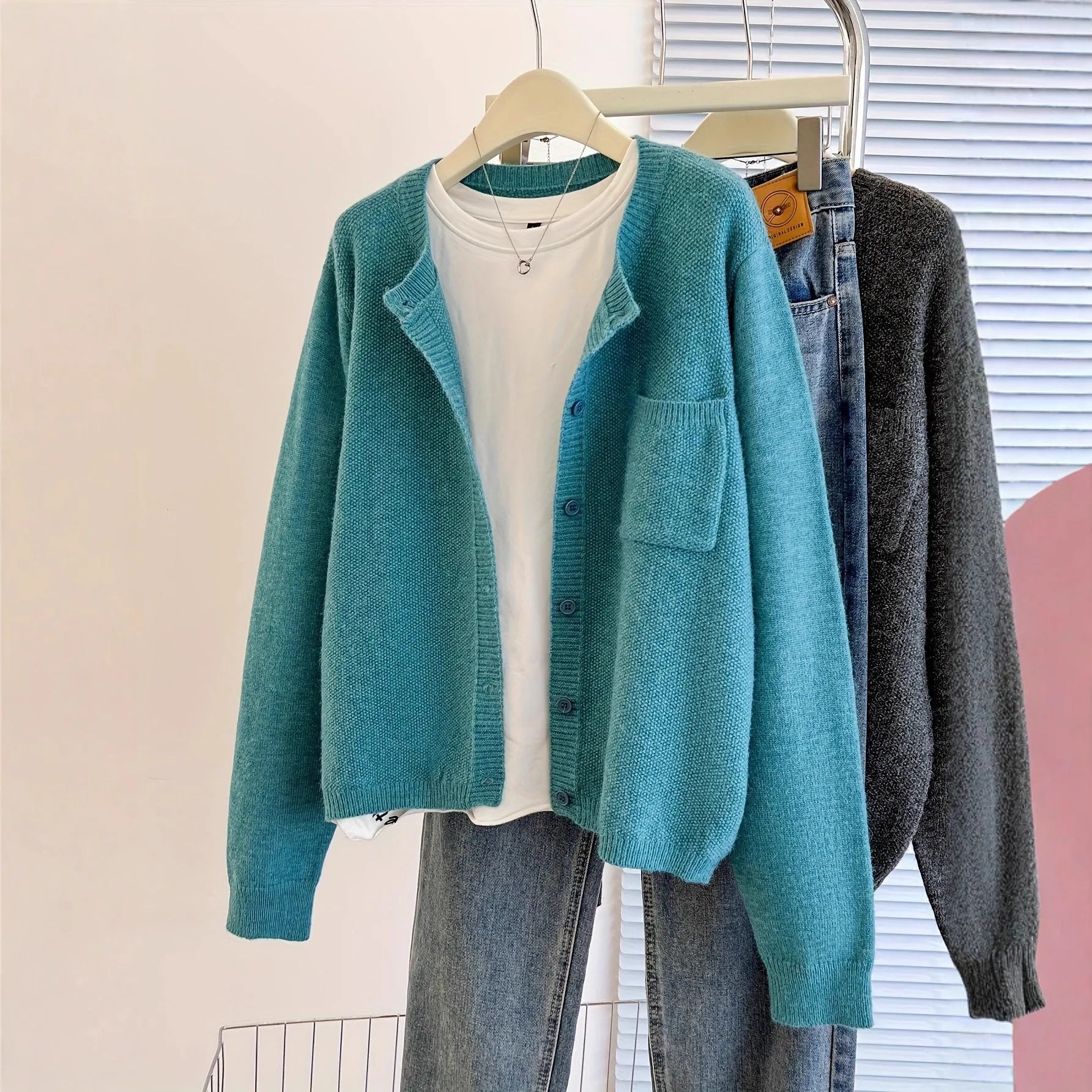 Solid colour round neck cardigan jacket for women in sky blue with button front and princess sleeves