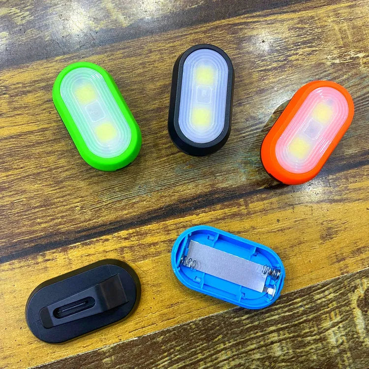 Compact keychain light with 3W LED in black, blue, green, and orange ABS casing
