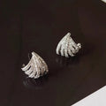 Geometric zircon earrings for women with a platinum electroplated finish.
