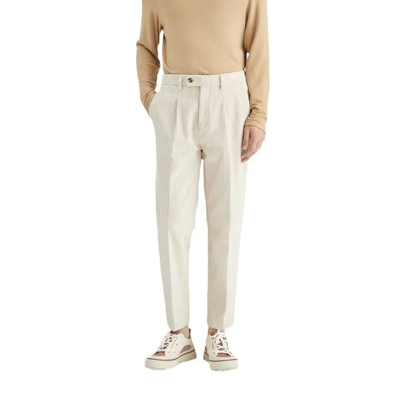 Men's straight-leg corduroy trousers in beige colour showing micro elastic waistband and loose fit design