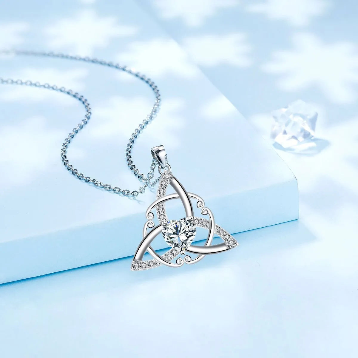 Geometric Celtic knot women's necklace in electroplated copper showing colour options
