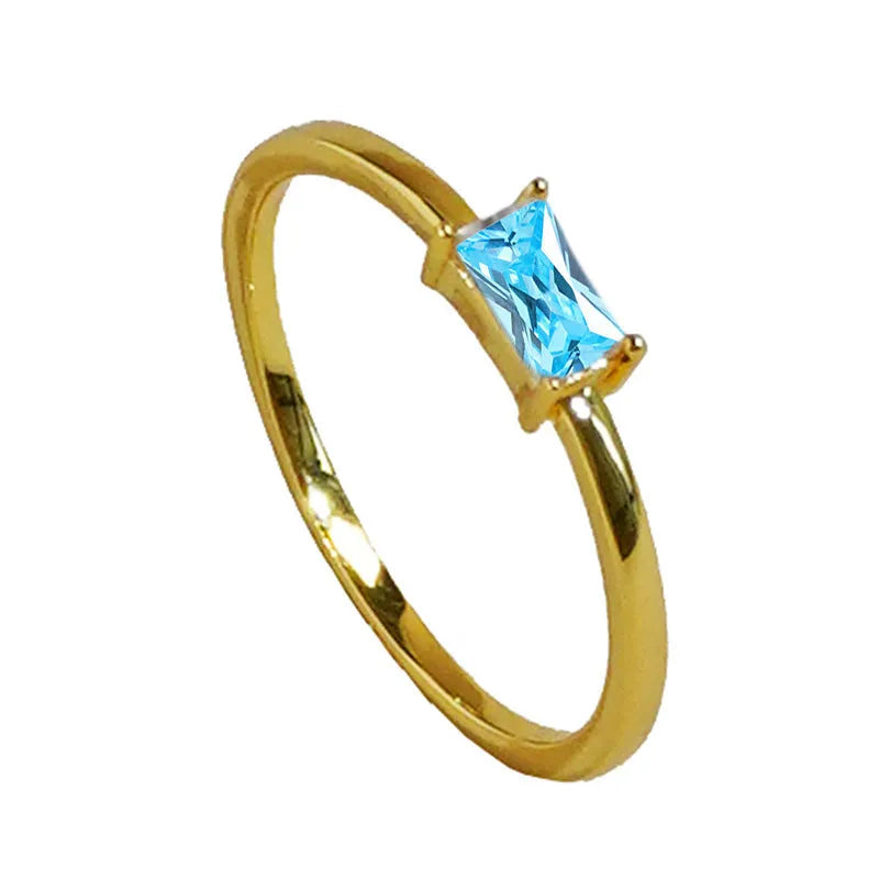 Sapphire blue zircon geometric bracelet ring for women on copper, showing oval and love shapes.