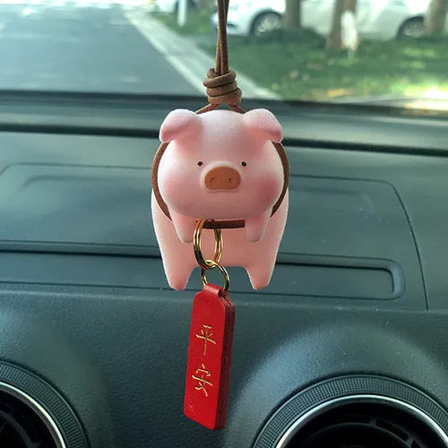Cute cartoon pig resin figurine car dashboard ornament in one of eight available styles.