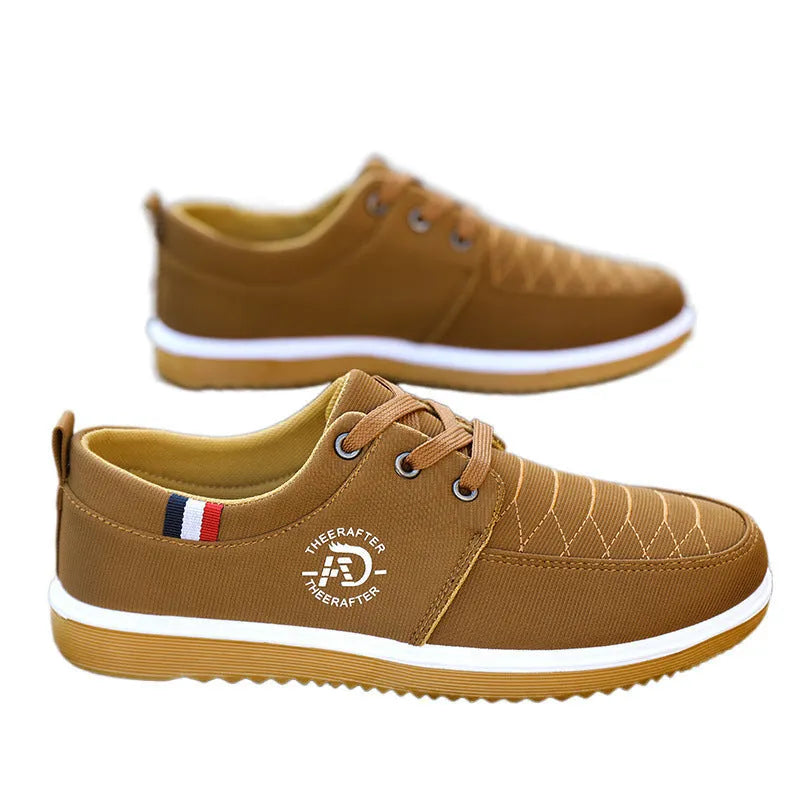 Men's black canvas platform casual work shoes with leather toe cap and textured sewing line detail.