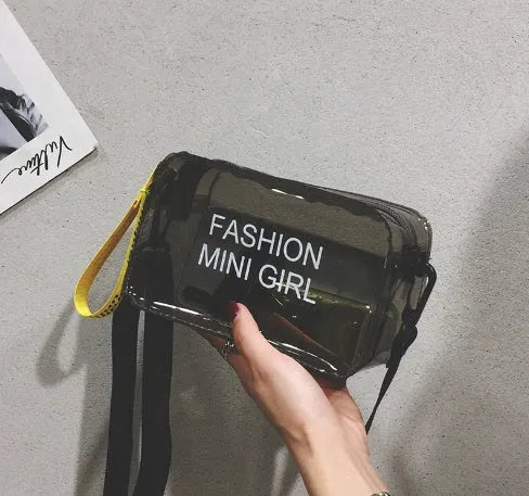 Transparent square jelly shoulder bag in PC material with an adjustable strap, shown in a light colour.