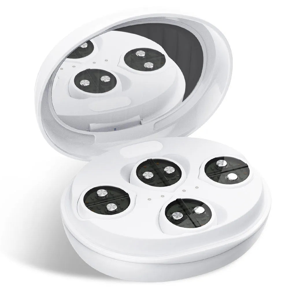 White wireless red light EMS handheld facial and eye massager on a clean background.