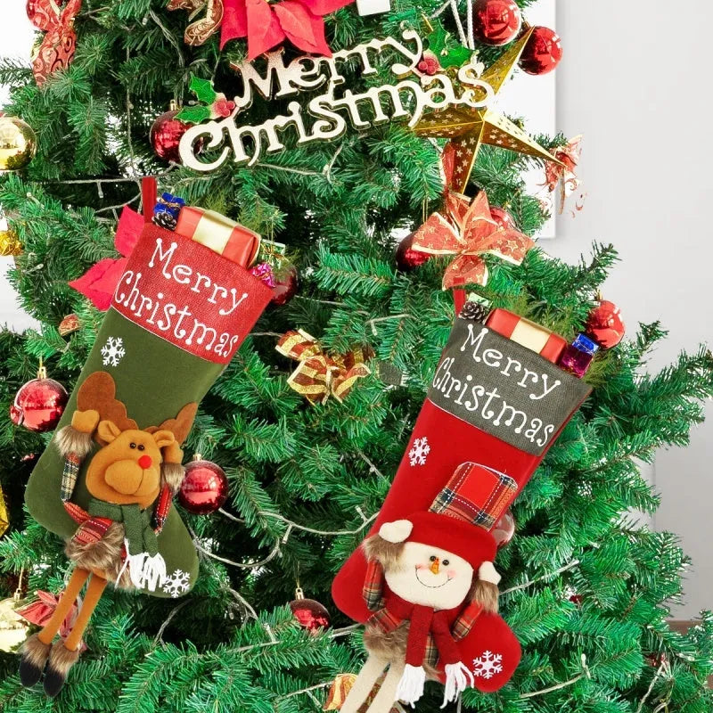 Three large Christmas stockings with 3D Santa, Snowman, and Reindeer designs hanging from loops