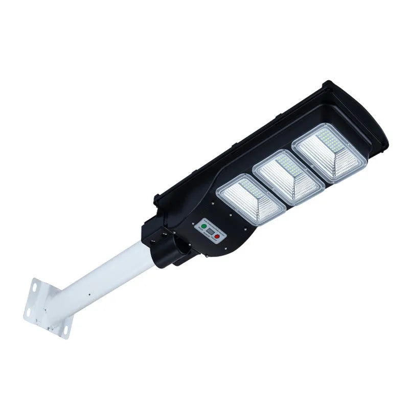 Integrated solar street light unit with solar panel and 60W LED lamp for outdoor use.