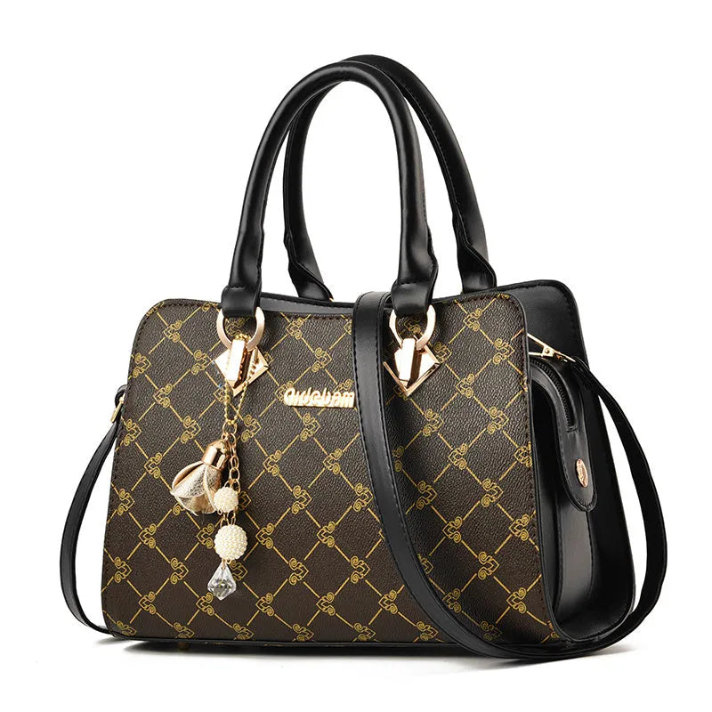 Women's geometric pattern PU leather messenger bag with zipper closure showing internal card slot and phone pocket.