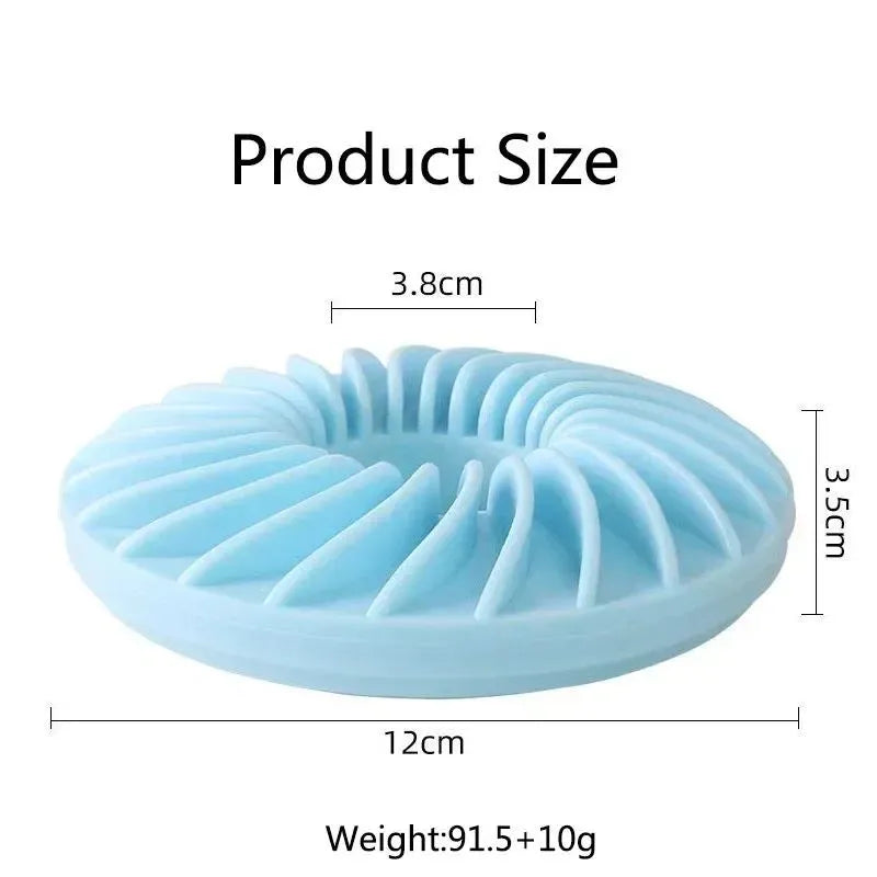 Soft round TPR leakage food pet toy for puppy slow feeding and teething in blue, green, and pink