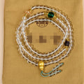 White crystal 108 bead rosary bracelet with geometric ethnic style design