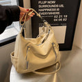 Retro PU shoulder commuter tote bag in black with horizontal square shape, sandwich zip pocket, and sandwich pocket