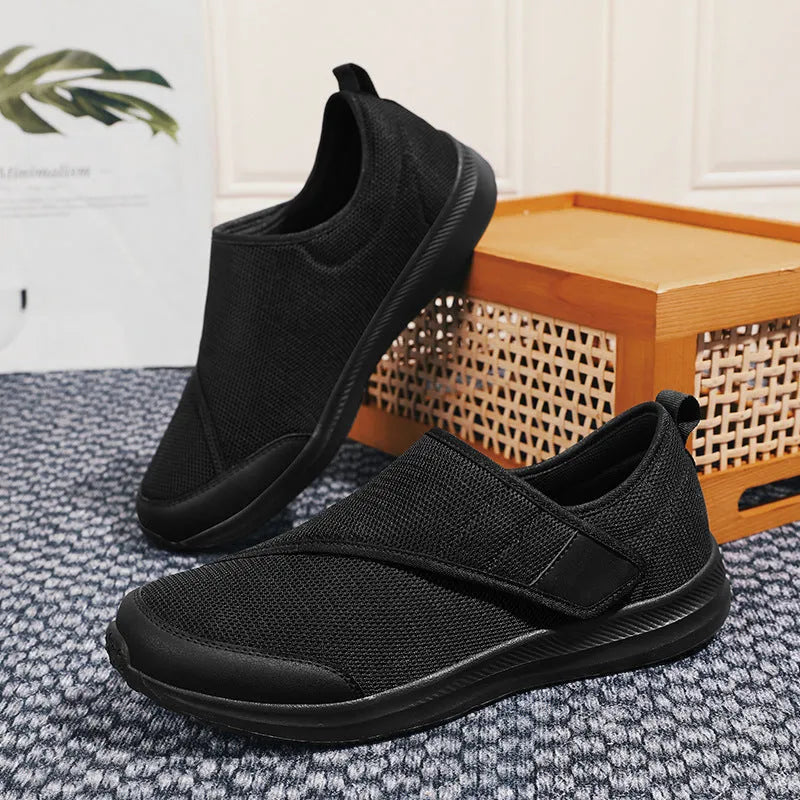 Summer walking shoes with mesh upper and Velcro closure in black, grey, blue, or wine red.