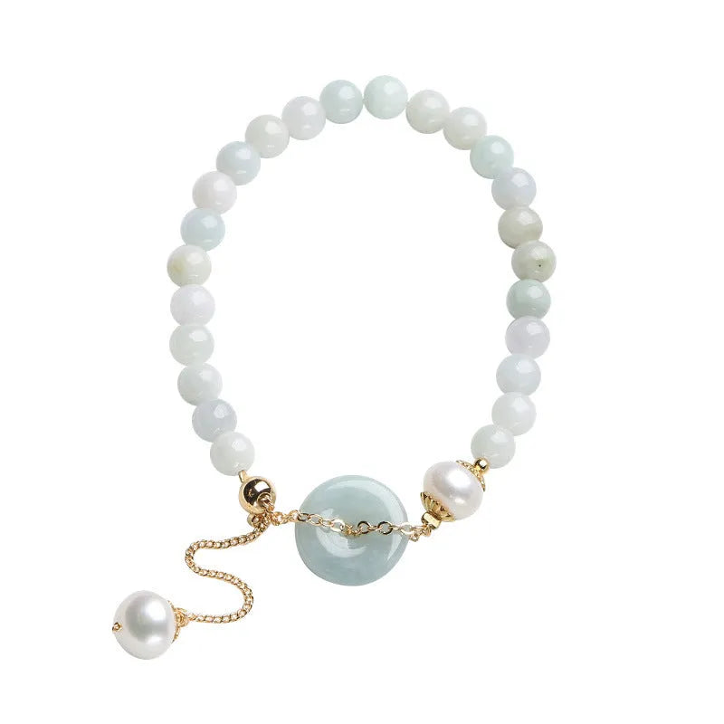 Jade green pearl bracelet with peace buckle fastening and round geometric pendant for women