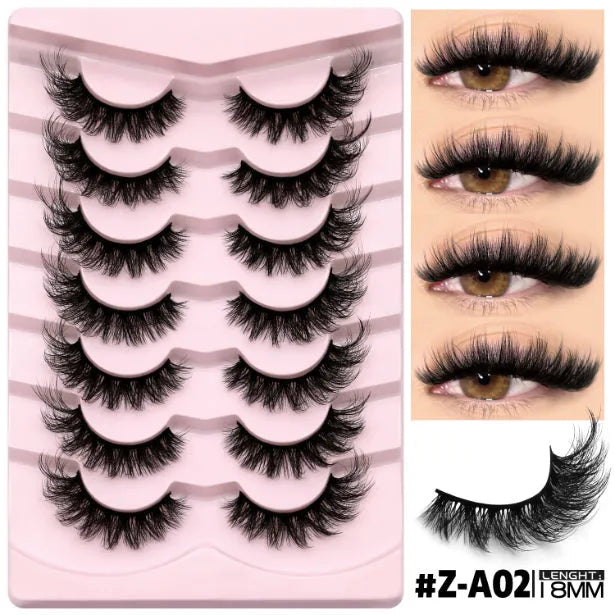 Box of black artificial fibre false eyelashes in a natural thick style with a tube of adhesive glue.