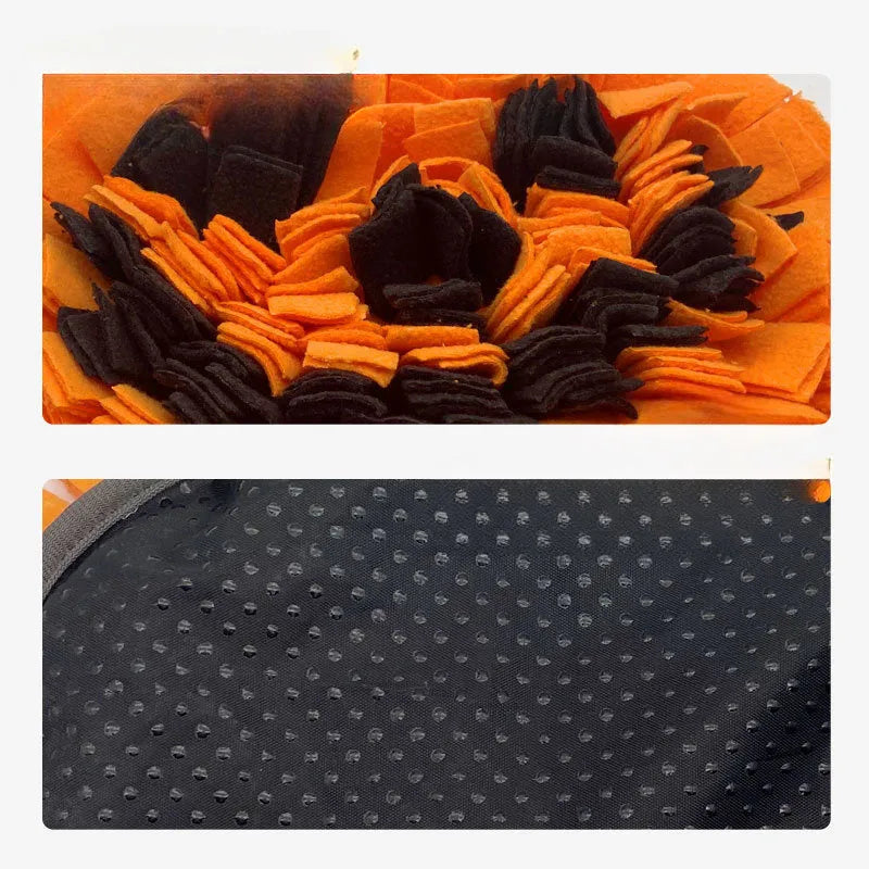 Orange pumpkin-shaped dog snuffle mat with textured surface for slow feeding and scent work training.