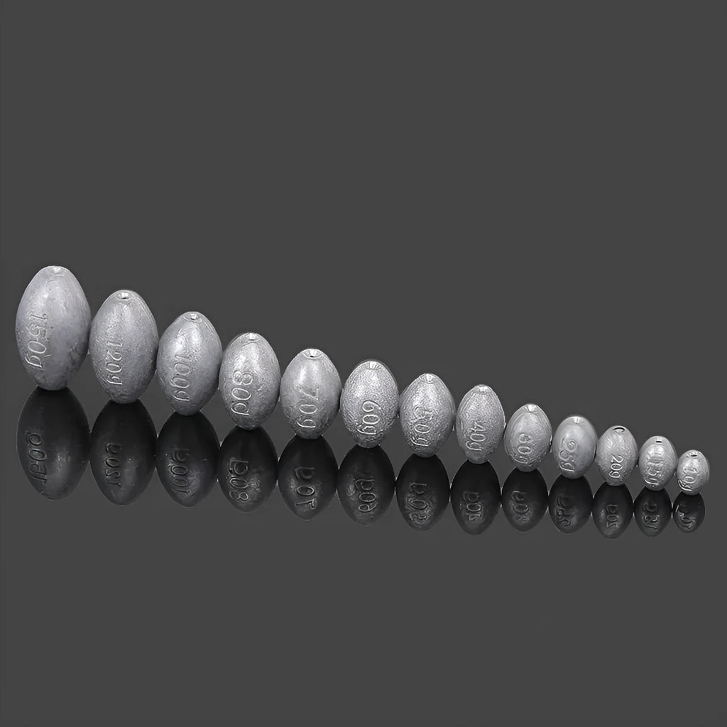 Close-up of a grey olive-shaped lead fishing sinker with scale texture, showing the central hole for rigging.
