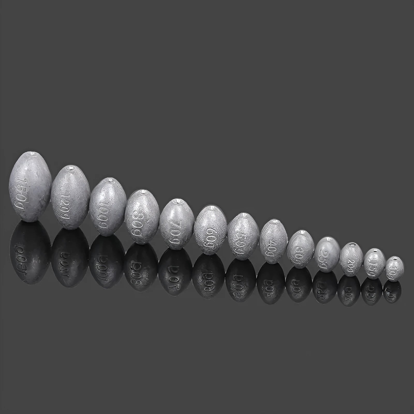 Close-up of a grey olive-shaped lead fishing sinker with scale texture, showing the central hole for rigging.