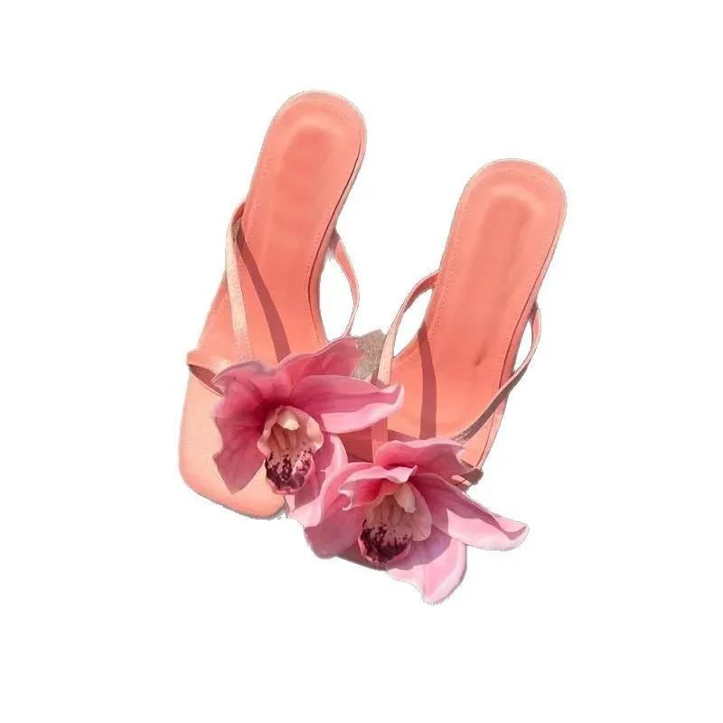 Pink women's sandals with satin uppers, artificial Phalaenopsis orchid decoration, and 3-6cm mid heel