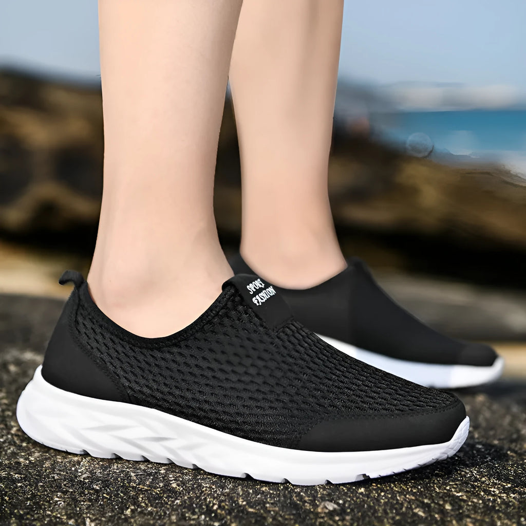 Pair of couple casual mesh shoes with PU mesh upper, hollow plaid detailing, and flat rubber sole in light gray, dark blue, black and white, or all black.