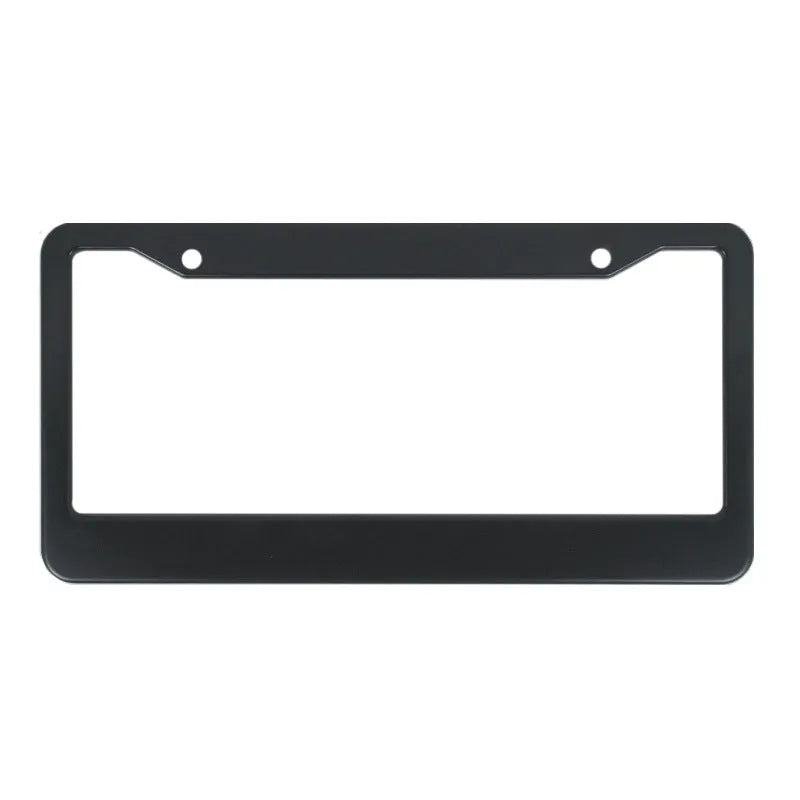 Minimalist black aluminium licence plate frame for American Standard cars, showing round hole design.