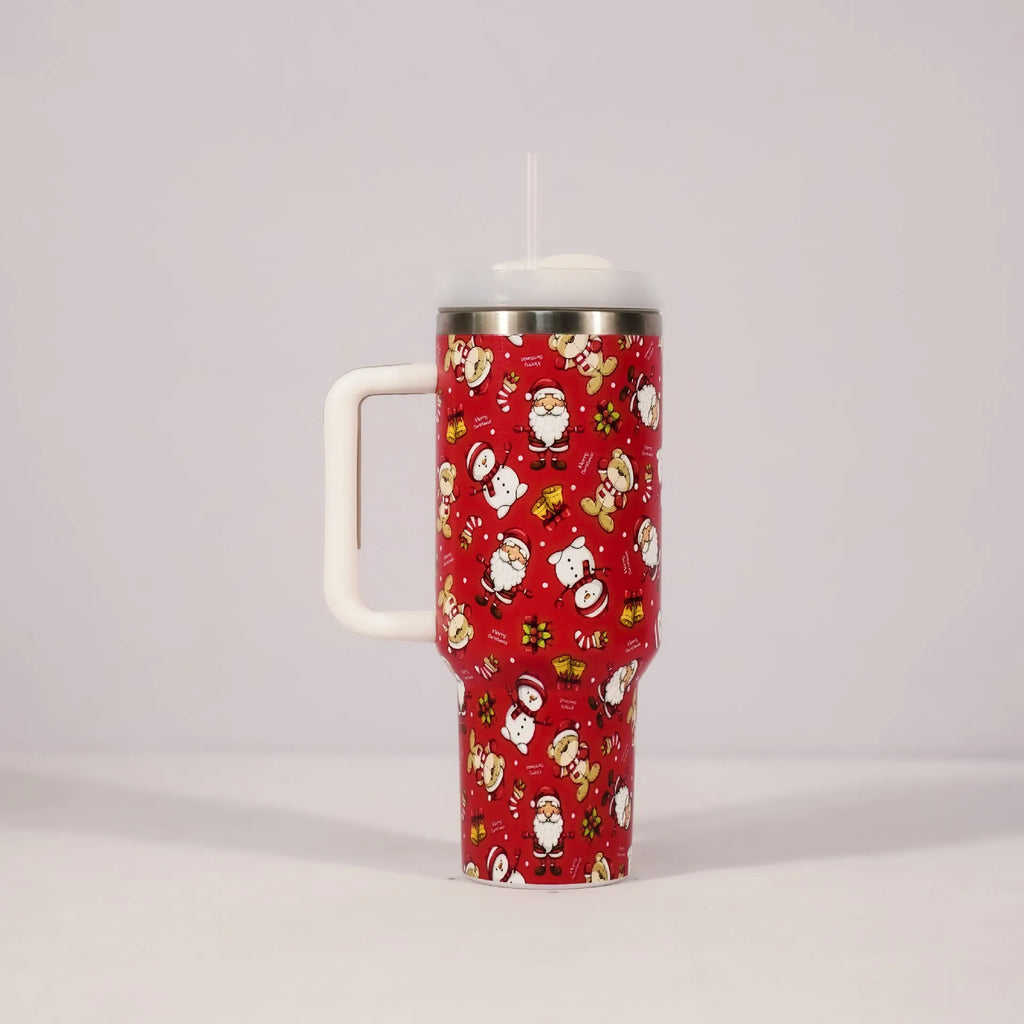 Red and green Christmas pattern stainless steel travel tumbler with handle and straw.