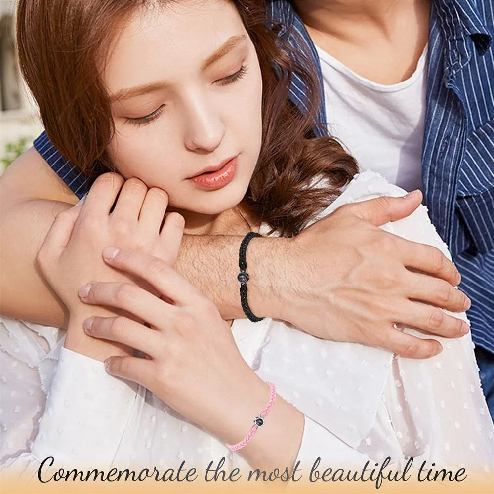 Personalised photo projection bracelet with green leaf fine band and diamond accents, round copper case, available in multiple colours.