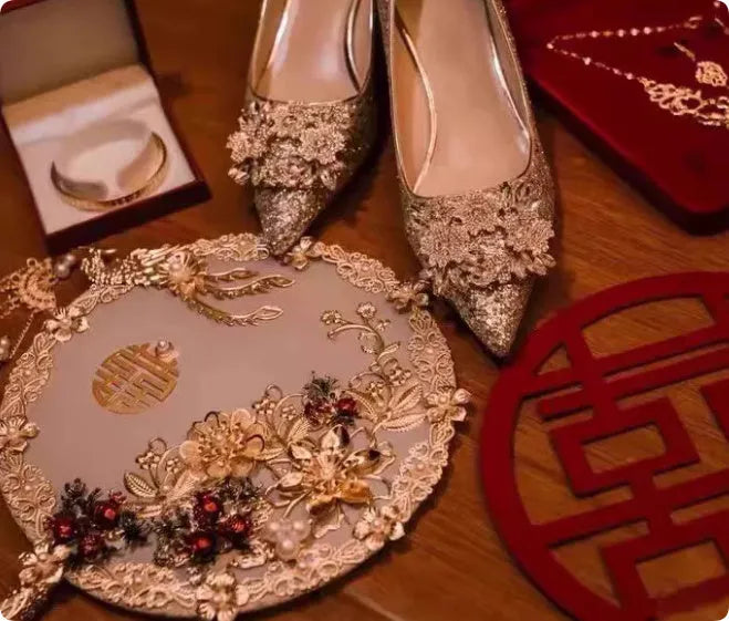 Champagne coloured pointed toe bridal shoes with rhinestone decoration and fine heel